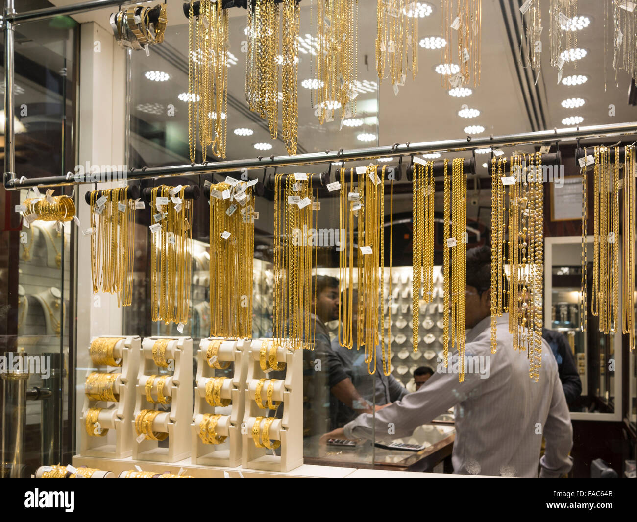 Window display of gold necklace and ornaments in Dubai gold souk