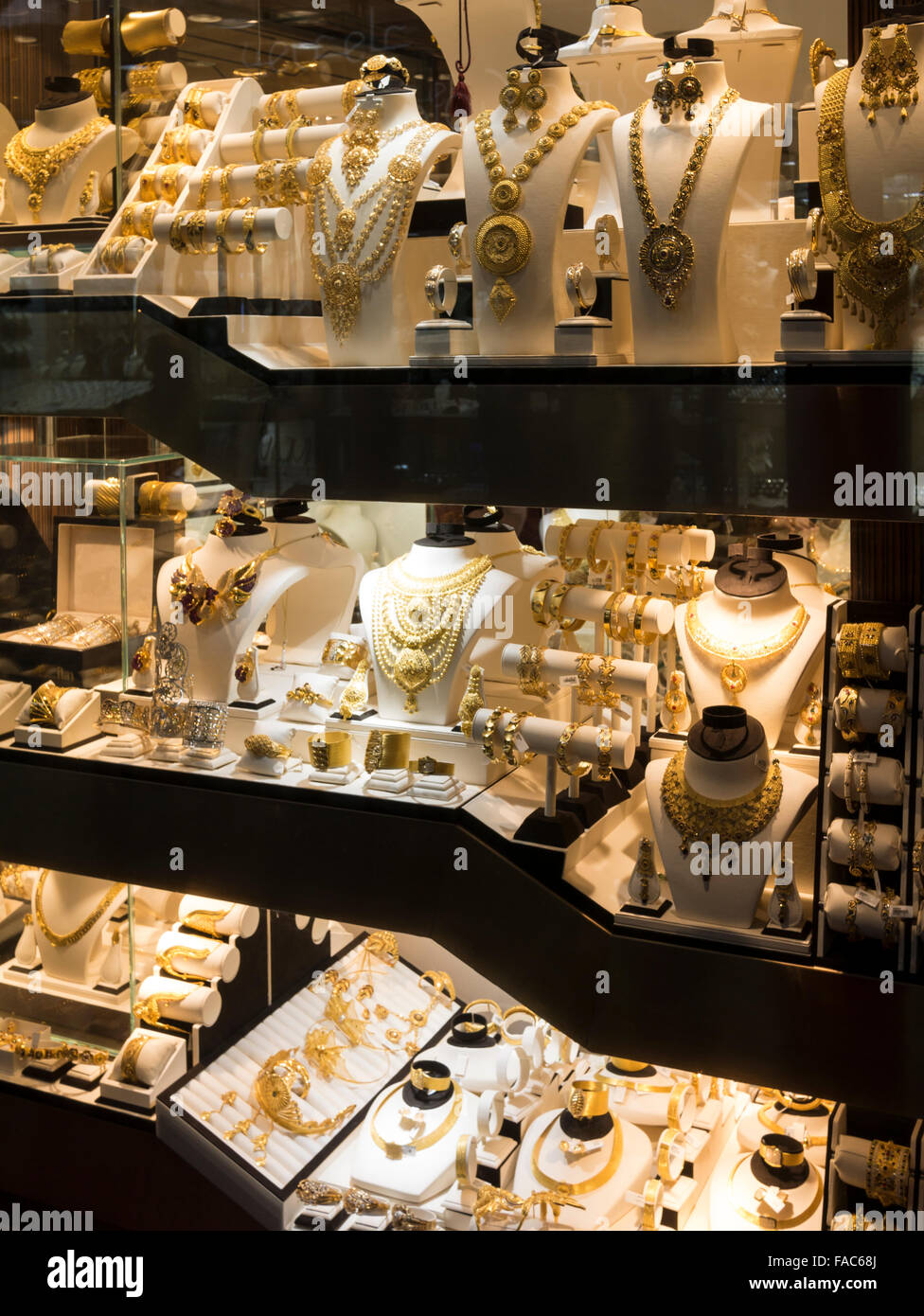 Window display of gold necklace and ornaments in Dubai gold souk, United Arab Emirates (UAE). Stock Photo