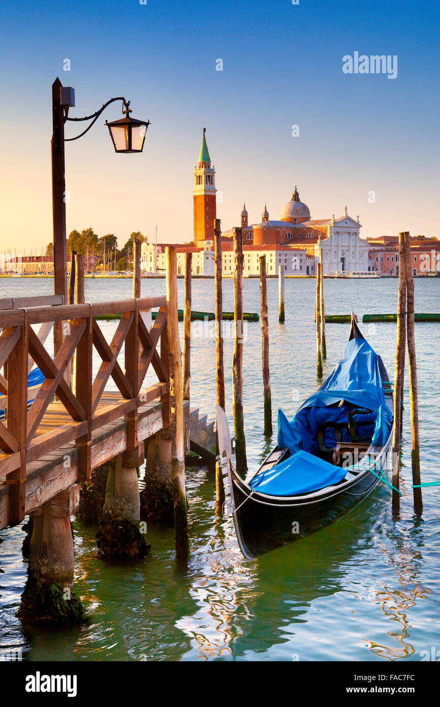 Venice Grand Canal - venetian gondola moored to molo San Marco, Venice, Italy Stock Photo