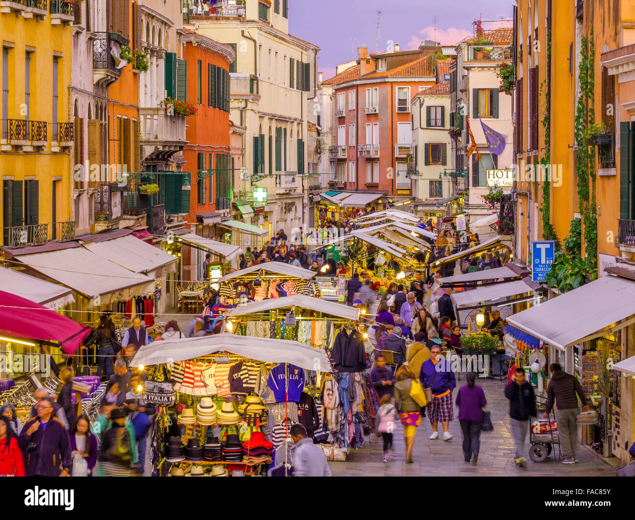 Outdoor market at dusk/night on Rio Terà S. Leonardo street in Venice