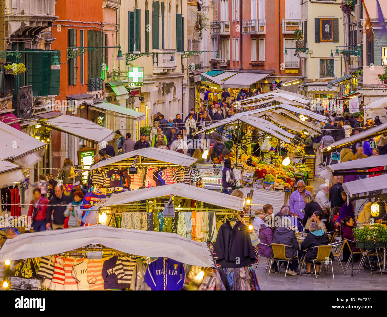 Outdoor market at dusk/night on Rio Terà S. Leonardo street in Venice