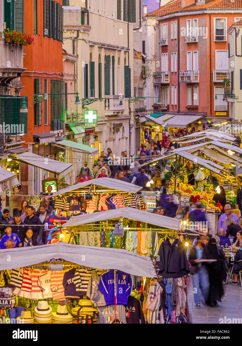 Outdoor market at dusk/night on Rio Terà S. Leonardo street in Venice