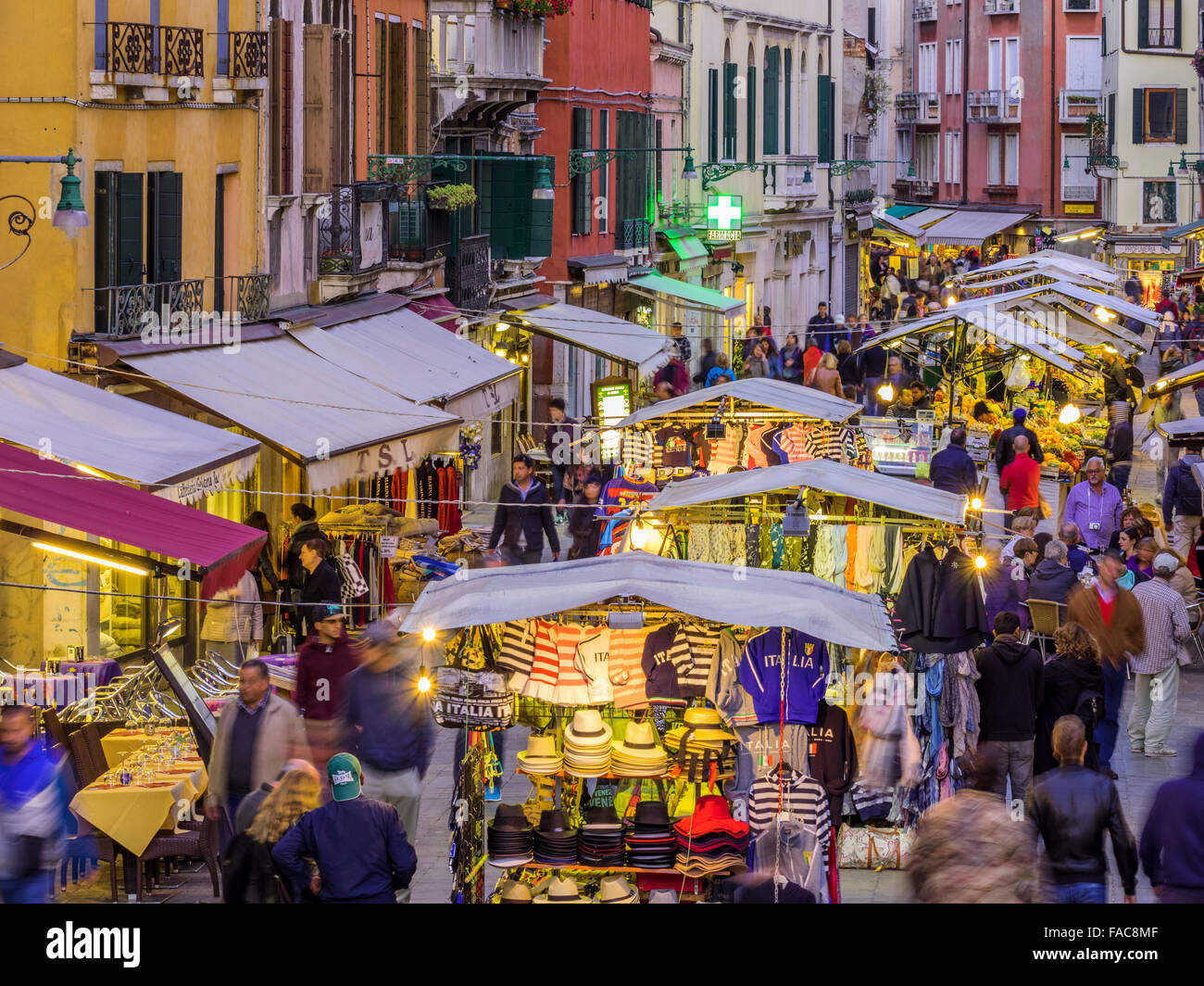 Outdoor market at dusk/night on Rio Terà S. Leonardo street in Venice