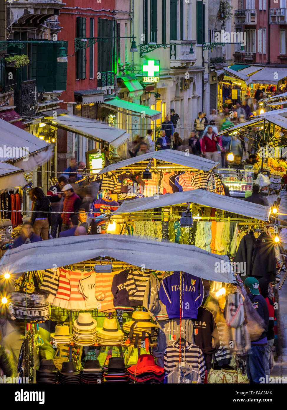 Outdoor market at dusk/night on Rio Terà S. Leonardo street in Venice