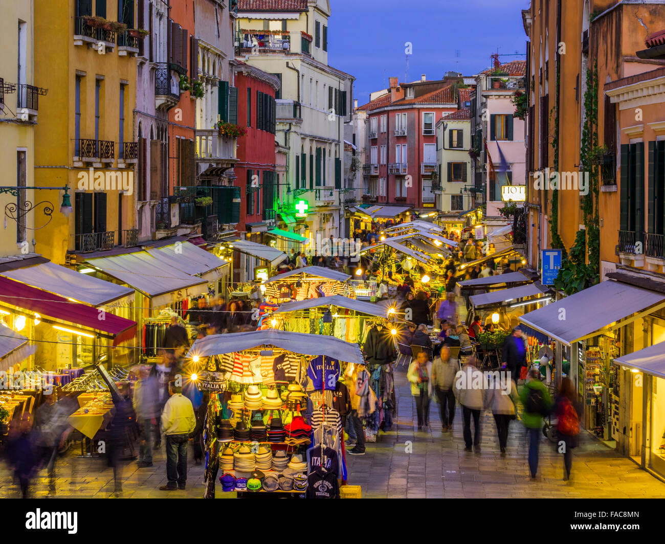Outdoor market at dusk/night on Rio Terà S. Leonardo street in Venice