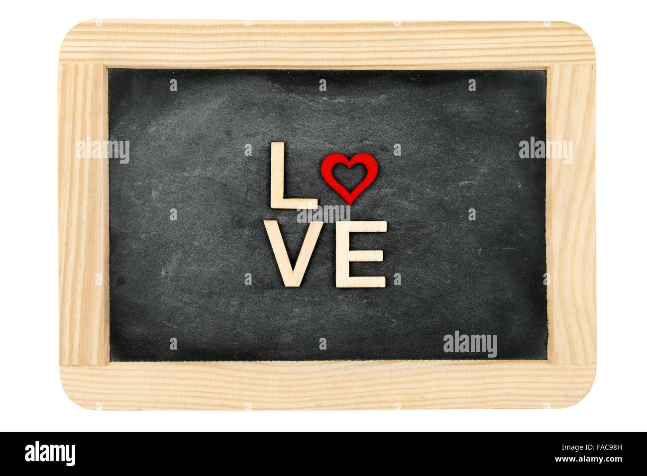 Wooden frame vintage chalkboard isolated on white with word LOVE created of wood letters, red wooden heart shape in the middle Stock Photo