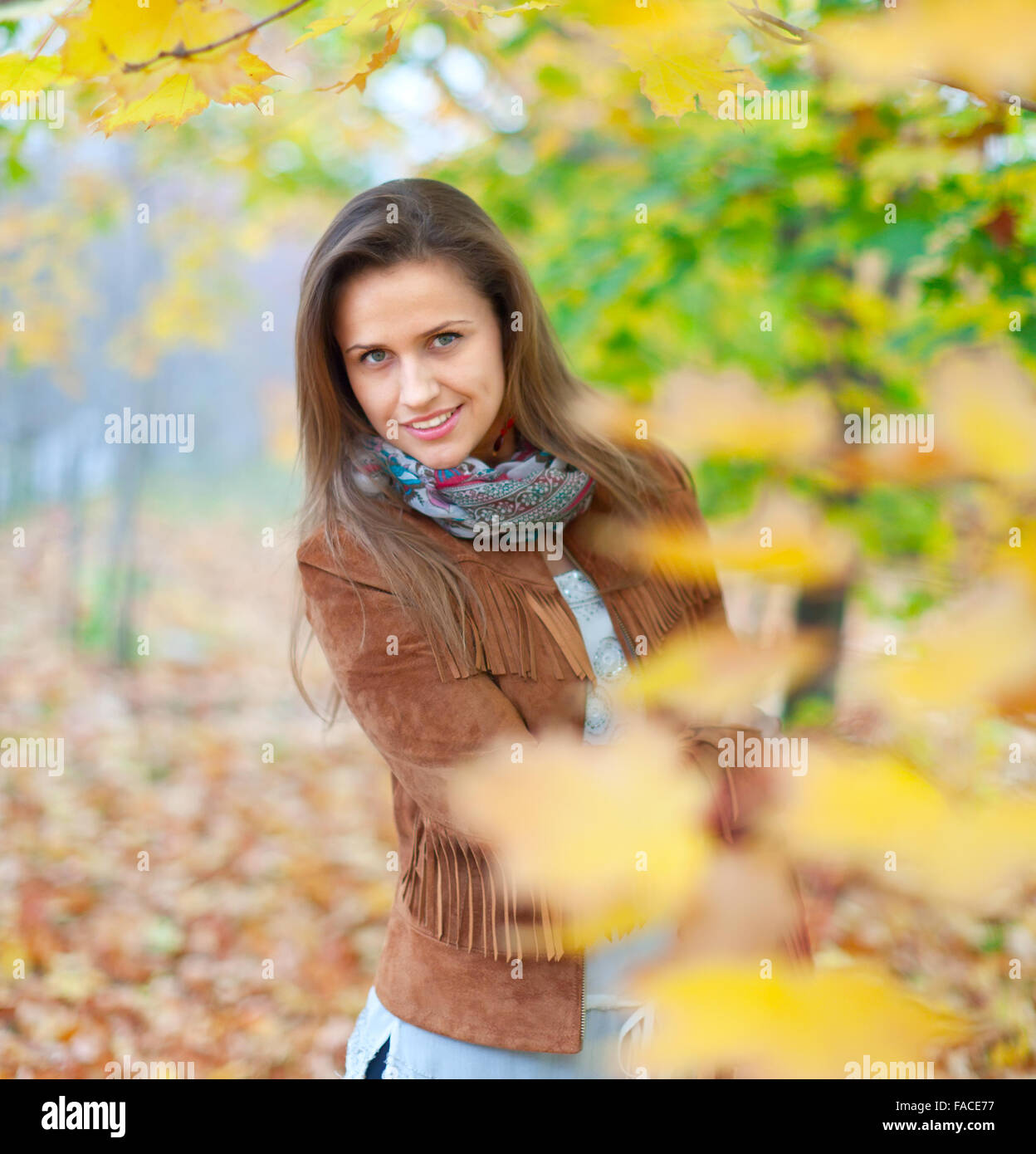 Portrait of beauty girl in autumn park Stock Photo - Alamy