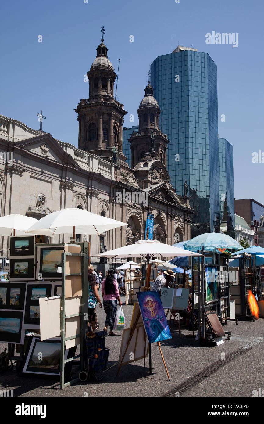 Market in Plaza de Armas square with Metropolitan Cathedral and modern office building, Santiago de Chile Stock Photo