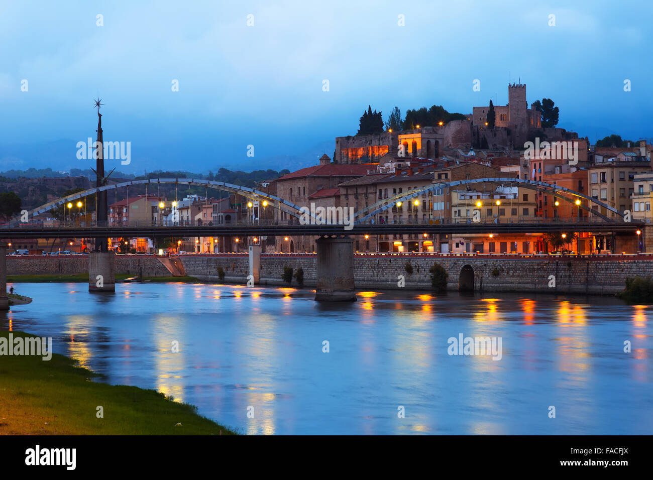 Evening view of Ebro  with bridge and Suda Castle in Tortosa.  Spain Stock Photo