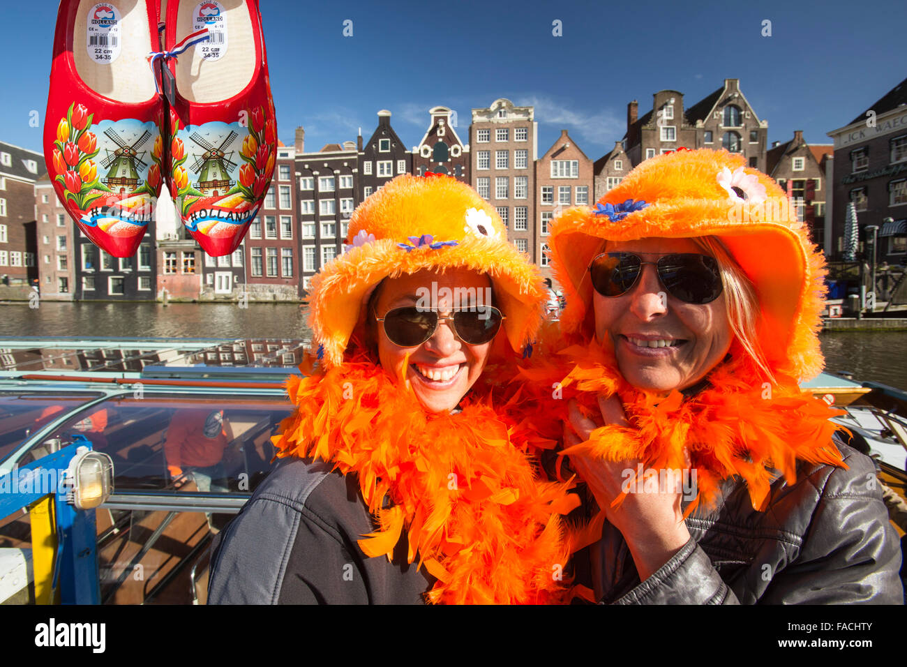 Dutch woman celebrating on Queens day in Amsterdam, Netherlands when the queen abdication to be replaced by the king. Stock Photo