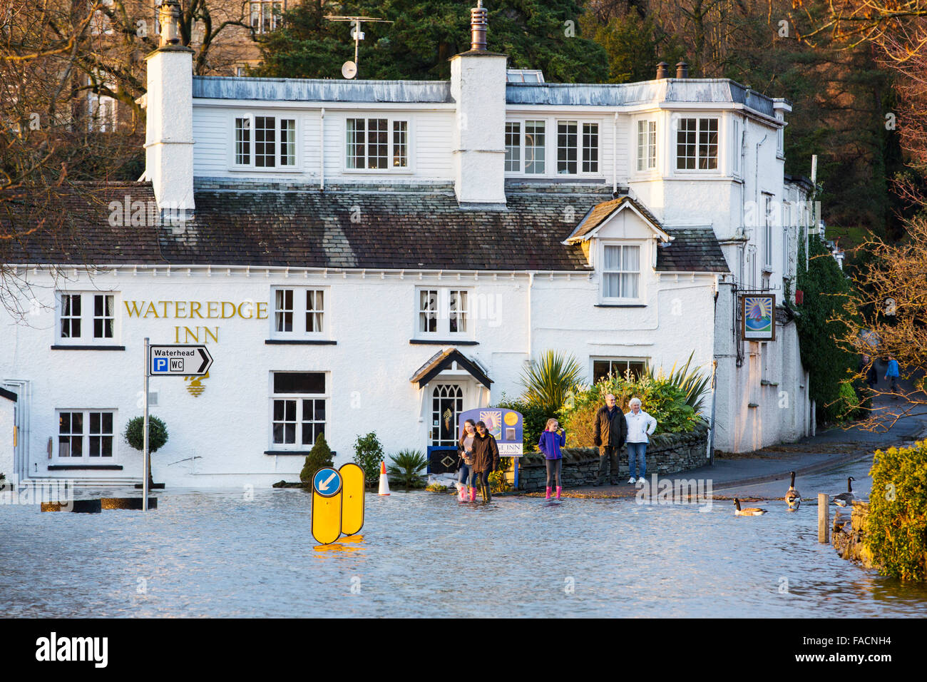 The Wateredge Inn surrounded by flood water after Lake Windermere burst its banks in Ambleside in the Lake District on Monday 7t Stock Photo