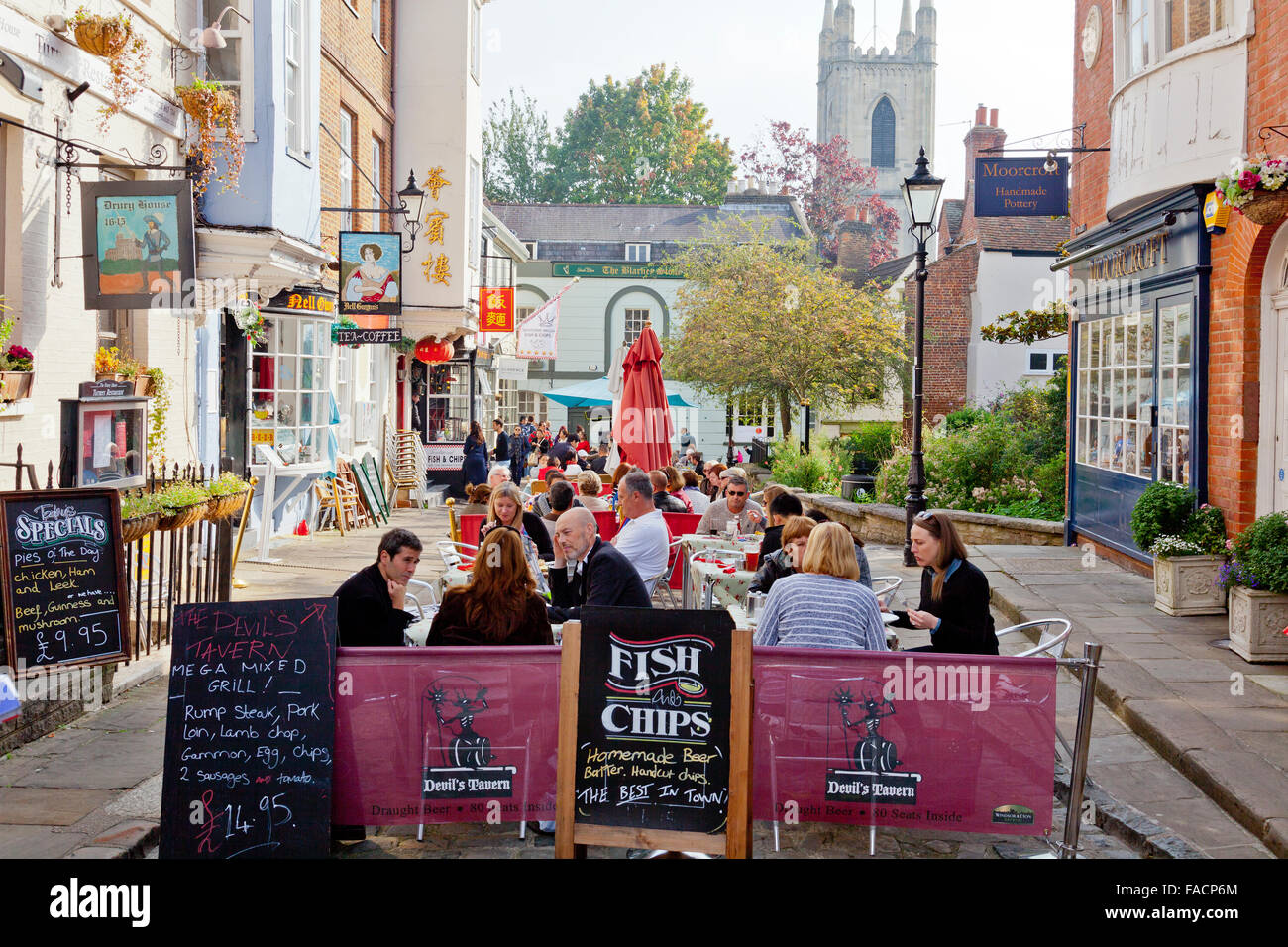 Open air dining in Church Street, Windsor where the road is now full of restaurant tables, Berkshire, England, UK Stock Photo