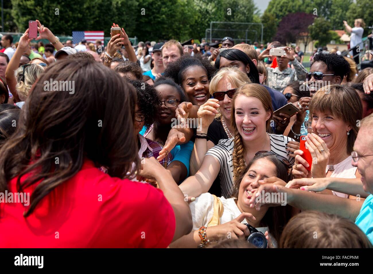 US First Lady Michelle Obama greets family of service members at U.S. Army Garrison Vicenza June 19, 2015 in Vicenza, Italy. Stock Photo