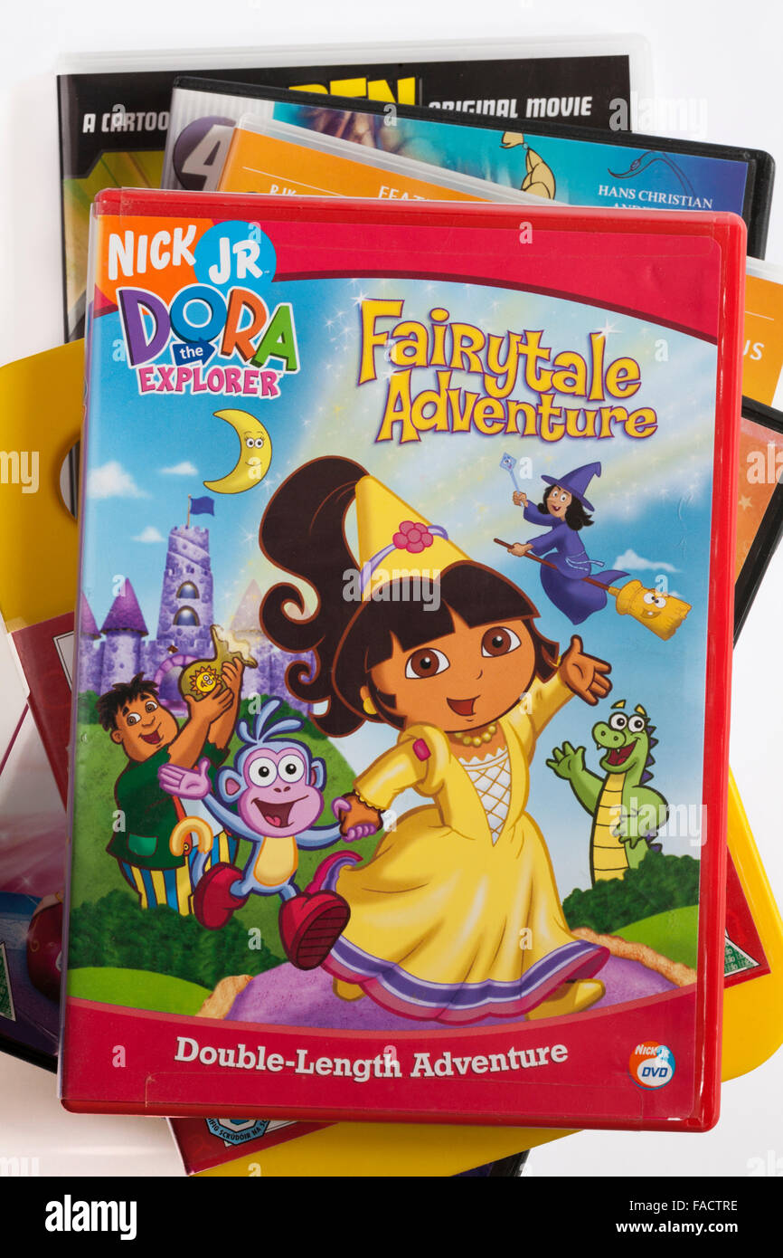 pile of DVDs with Dora the Explorer Fairytale Adventure DVD on top Stock Photo