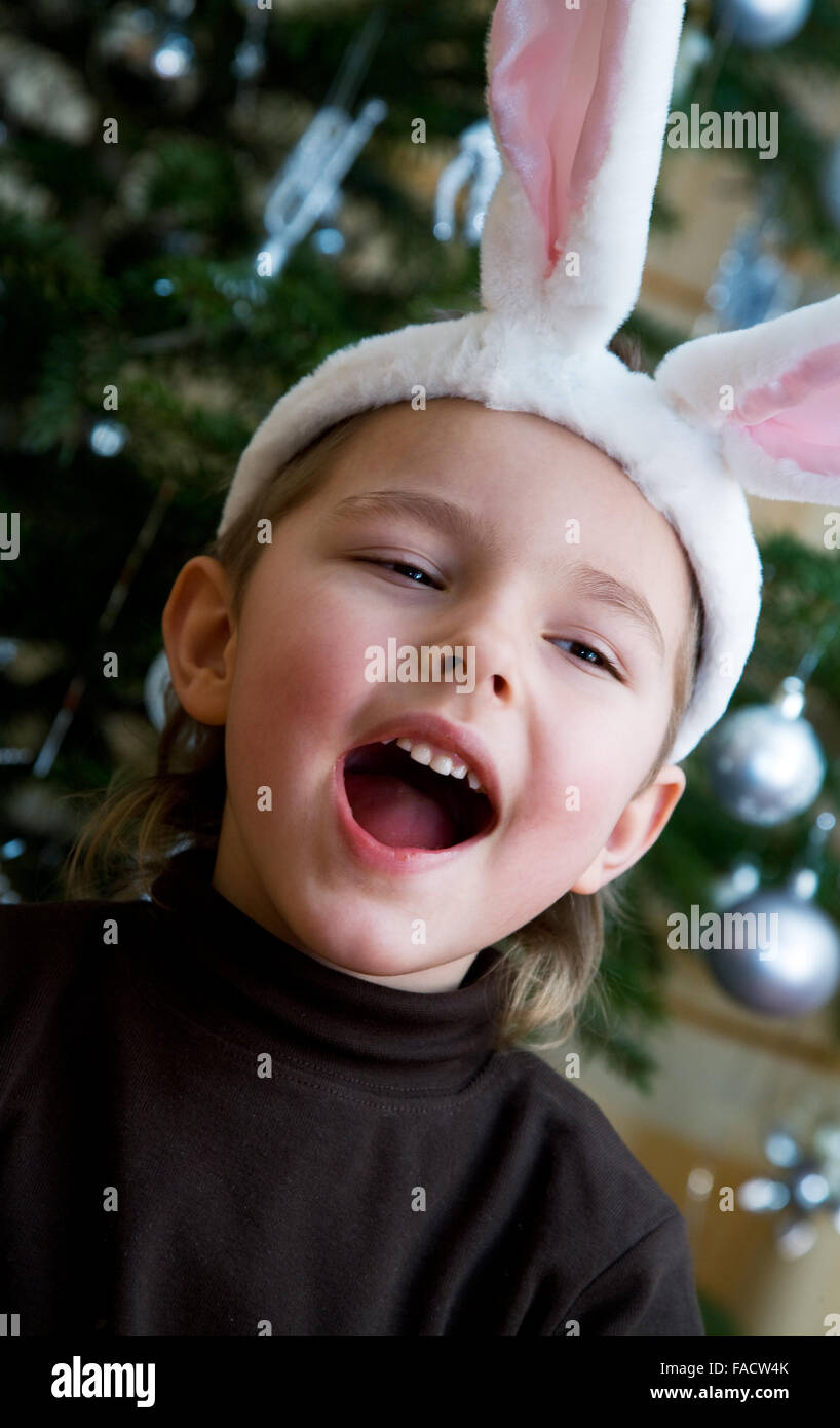 little boy in a white downy bunny costume. Stock Photo