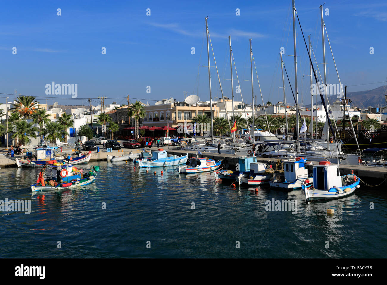 Sailing and fishing boats in Kardamena village harbour, Kos Island, Dodecanese group of islands, South Aegean Sea, Greece. Stock Photo