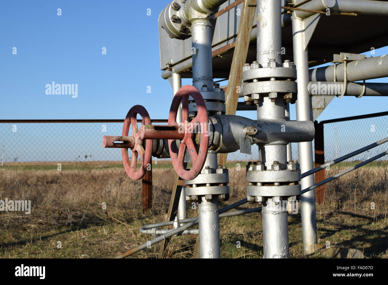 Equipment of an oil well. Shutoff valves and service equipment. Stock Photo