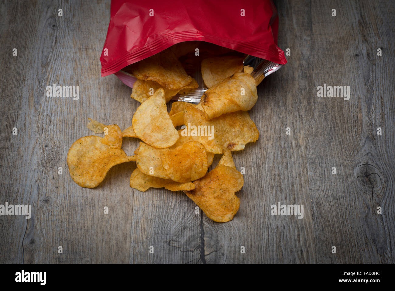 potato crisps and packet Stock Photo