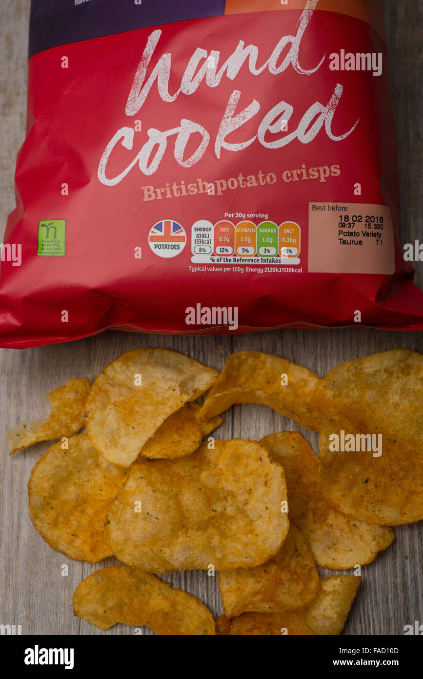 potato crisps and packet showing nutritional values Stock Photo