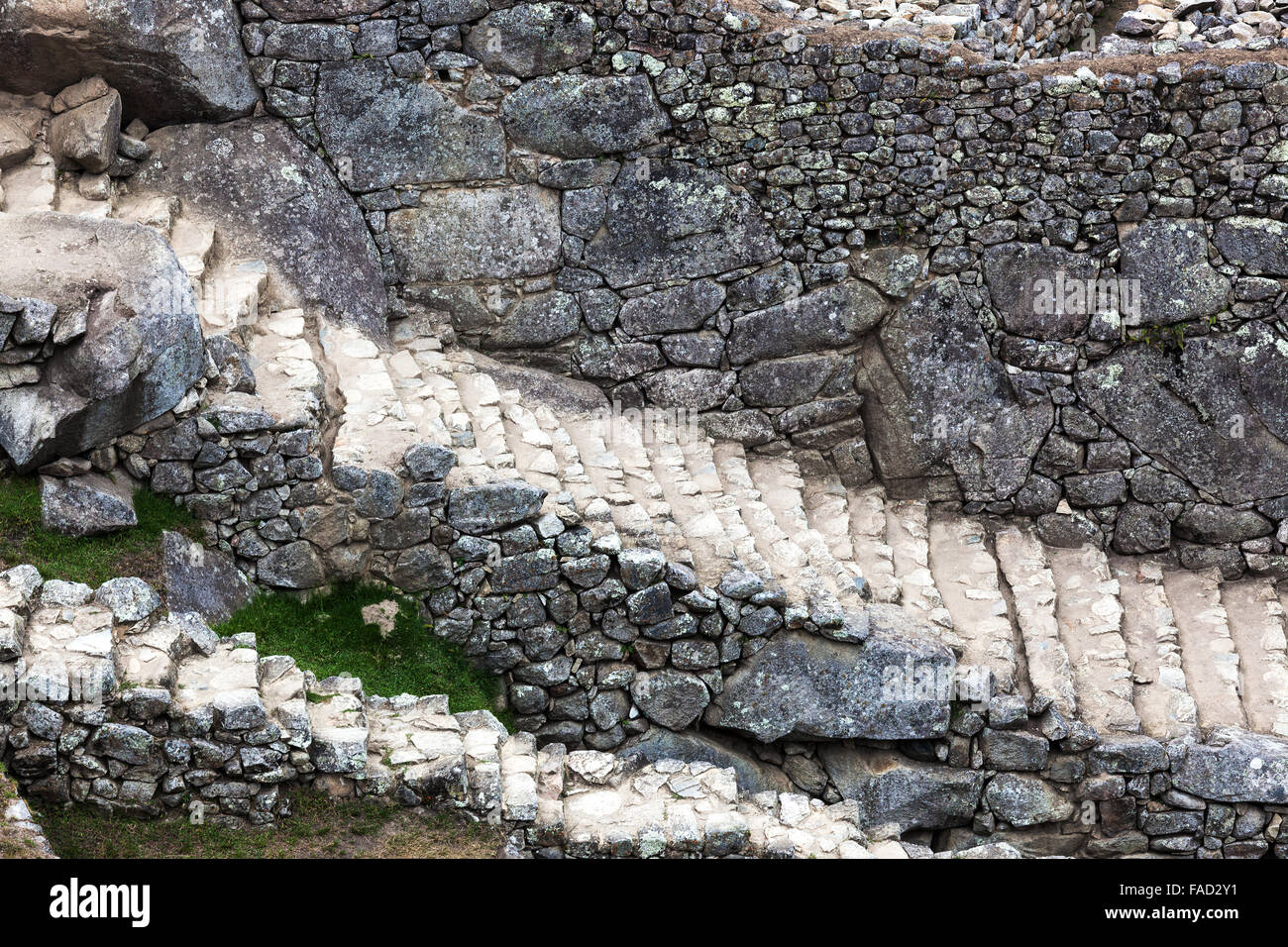 Stairs and stone wall in Machu Picchu Stock Photo - Alamy