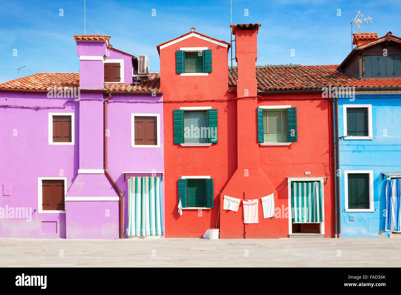 Characteristic colourful houses in village of Burano near Venice in Italy (Burano Lagoon Island), UNESCO Stock Photo