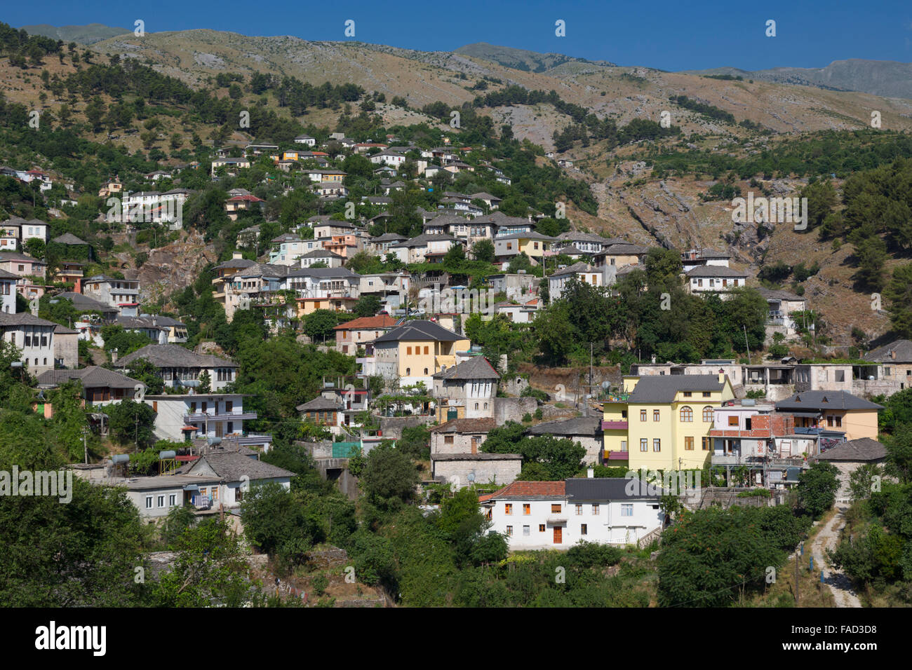Gjirokastra or Gjirokaster, Albania.  Typical traditional property on edge of old town. Stock Photo