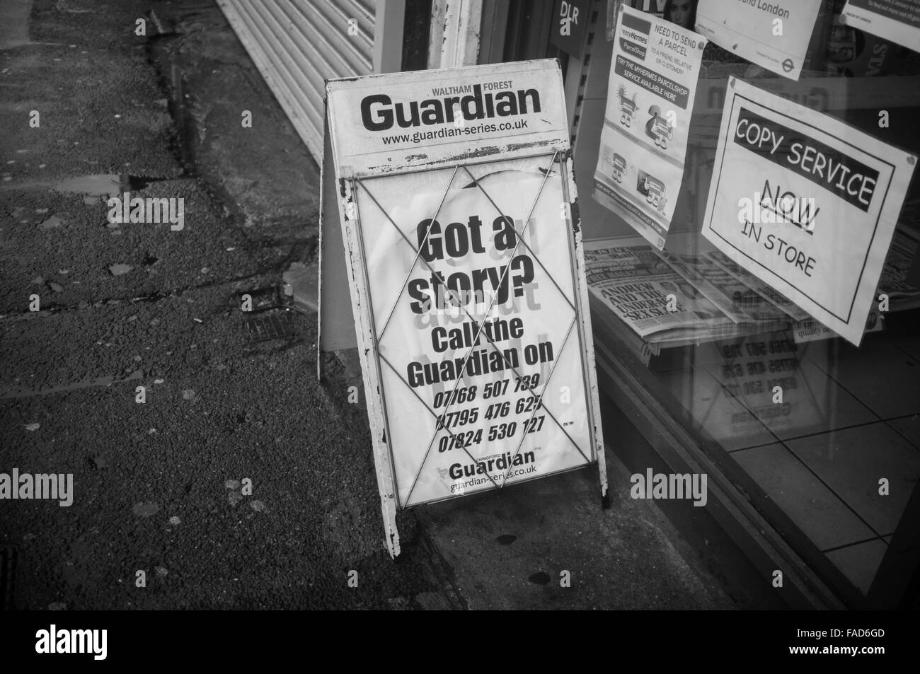 Sign by the Waltham Forest Guardian newspaper asking for stories Stock Photo