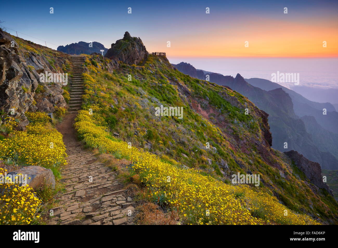 Mountain hiking trail from Pico do Arieiro to Pico Ruivo before sunrise, Madeira Island, Portugal Stock Photo