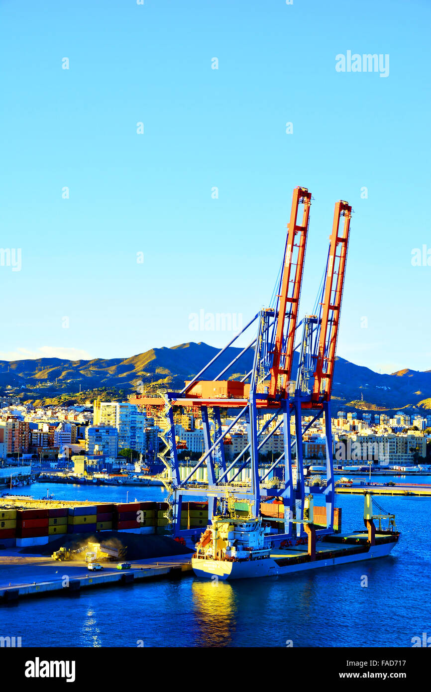 Malaga Spain industrial harbour docks cranes Stock Photo Alamy