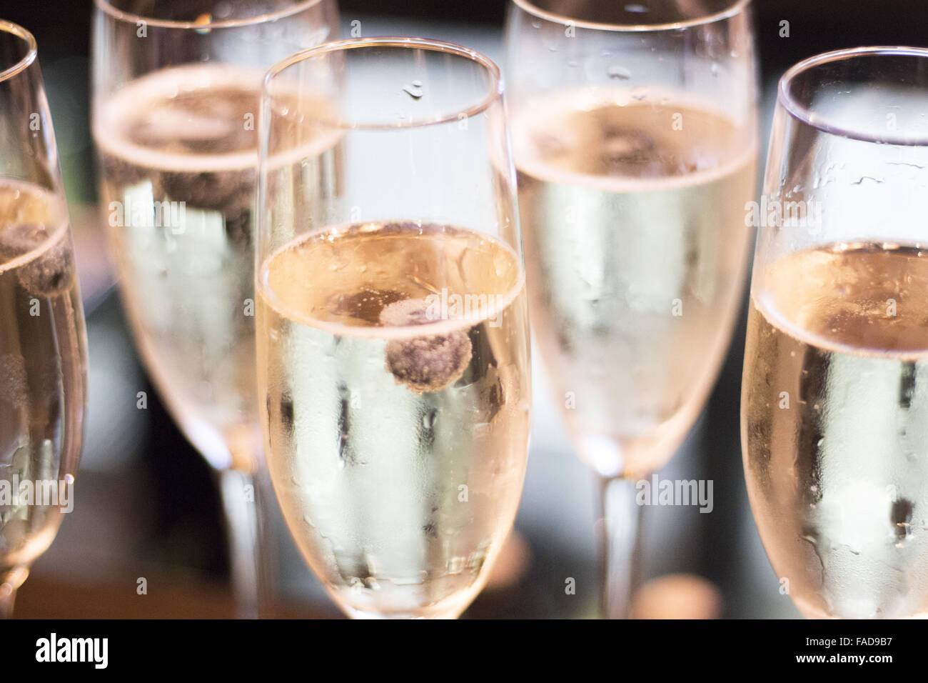 Champagne Sparkling White Wine Glasses In Restaurant Bar In Wedding Reception Party Photo Champagne Sparkling White Wine Glasses In Restaurant Bar In Wedding Reception Party Photo