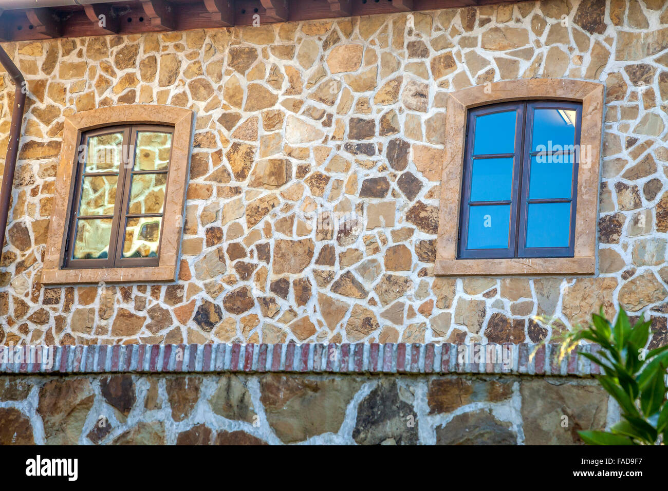 Windows on a stone wall at Jacuzzi Family Vineyard, Sonoma, California, USA Stock Photo