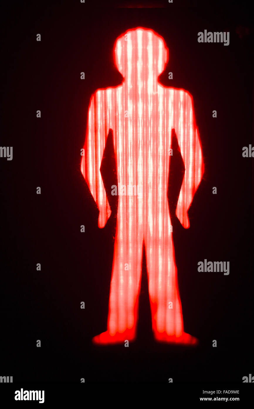 Green man go pedestrian traffic light sign Stock Photo - Alamy