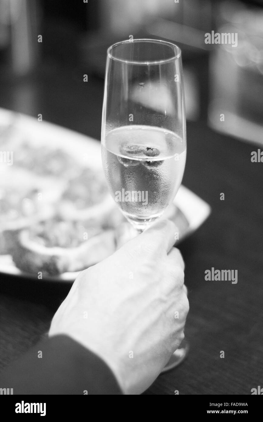 Champagne sparkling white wine glass flute in restaurant bar in wedding