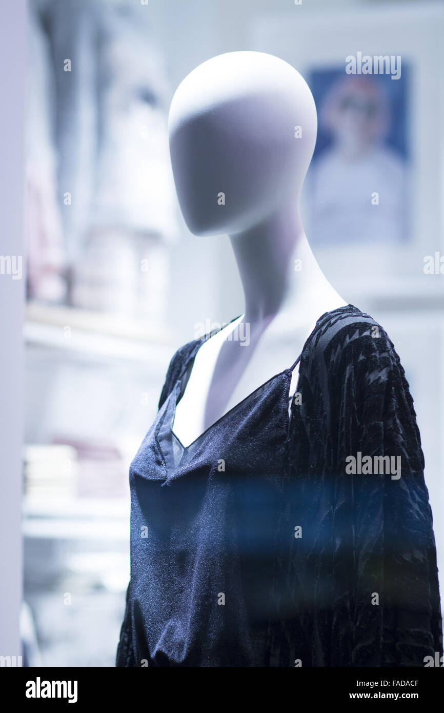 Female shop dummy fashion mannequin in department store boutique