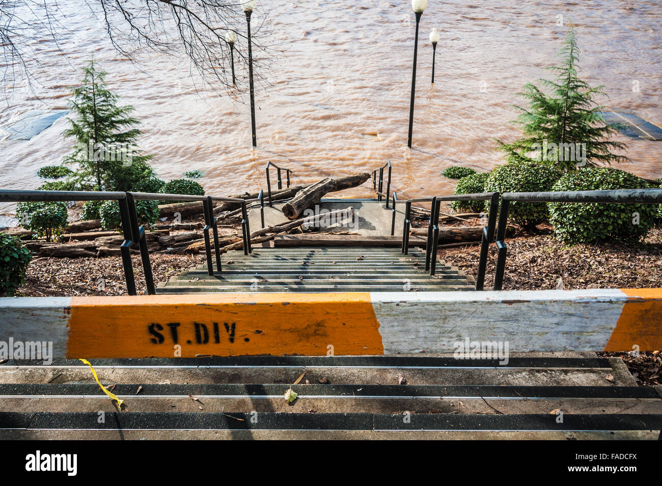 Flood waters of the Chattahoochee River submerge the Riverwalk area along downtown Columbus, Georgia during 2015 flood. Stock Photo