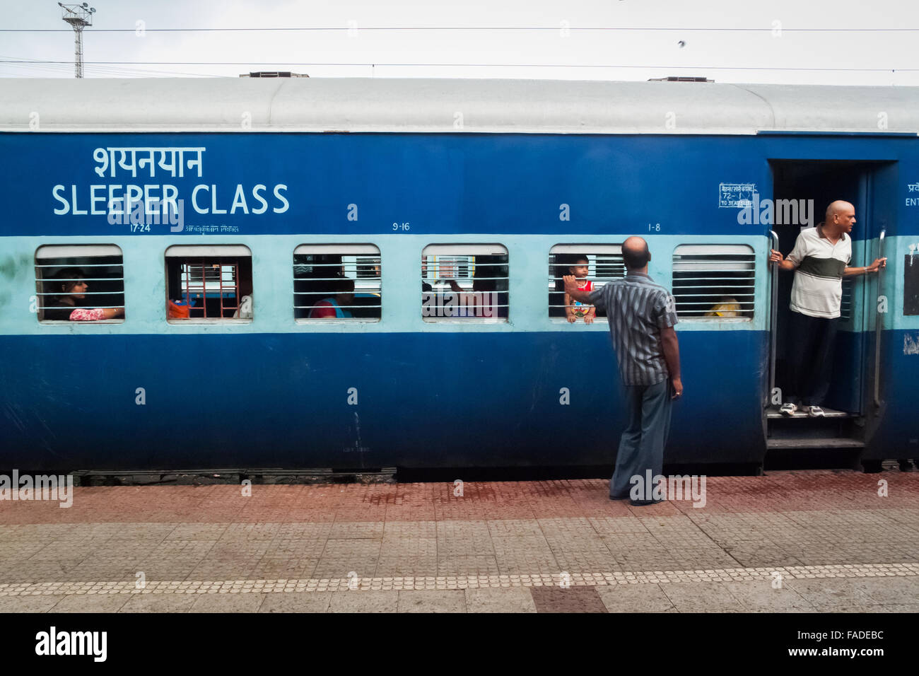 Sleeper class train waiting for departure time at Varanasi Junction, Varanasi train station in Uttar Pradesh, India. Stock Photo