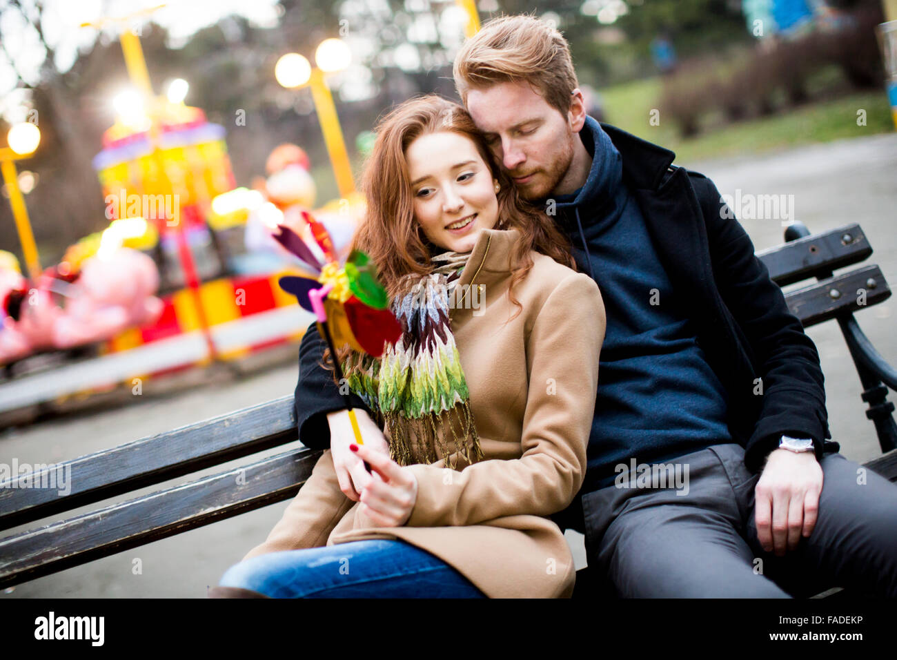 Young couple in the amusement park Stock Photo