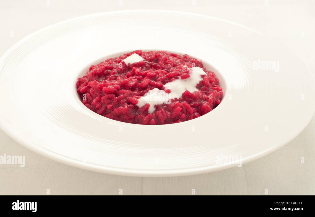 Beet risotto with cream cheese,italy Stock Photo Alamy