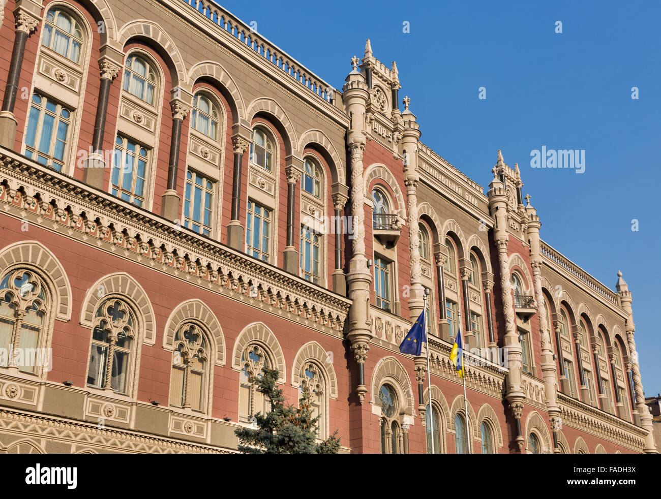 Flags of European Union and Ukraine in front of National Bank of Ukraine building in Kiev. Headquarters building was constructed Stock Photo