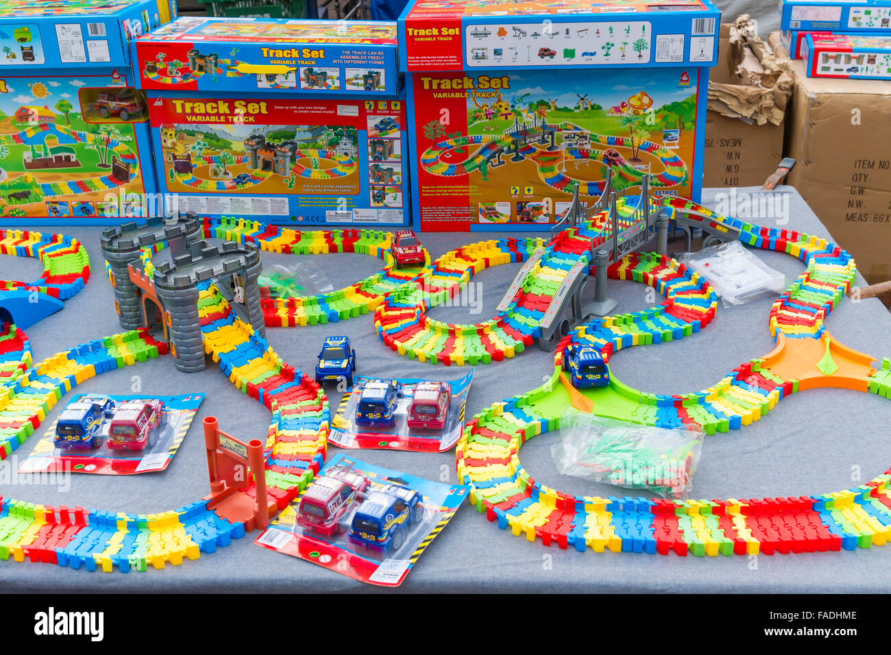 Market stall display of Children's toys Track Set variable layout and battery powered cars Stock Photo