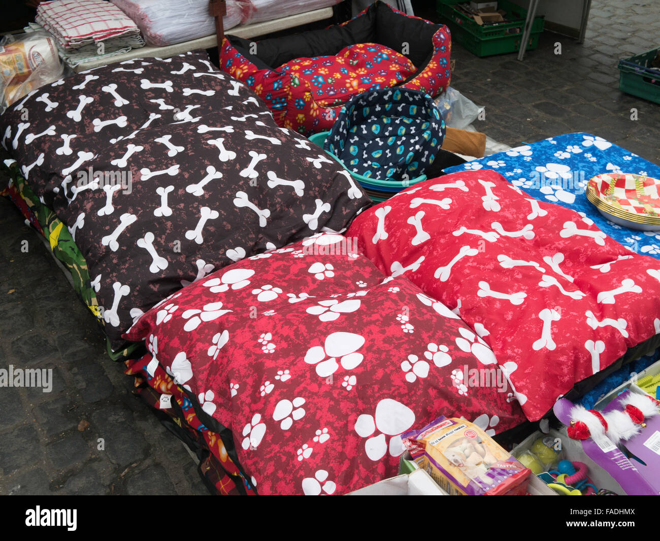 A display of pet  dogs and cats bedding on a stall at a weekly small town English Market Stock Photo