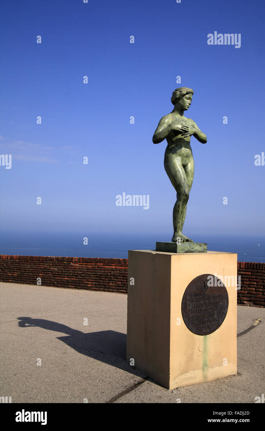 Bronze statue in a yard by the sea at the Castle of Montjuic in ...
