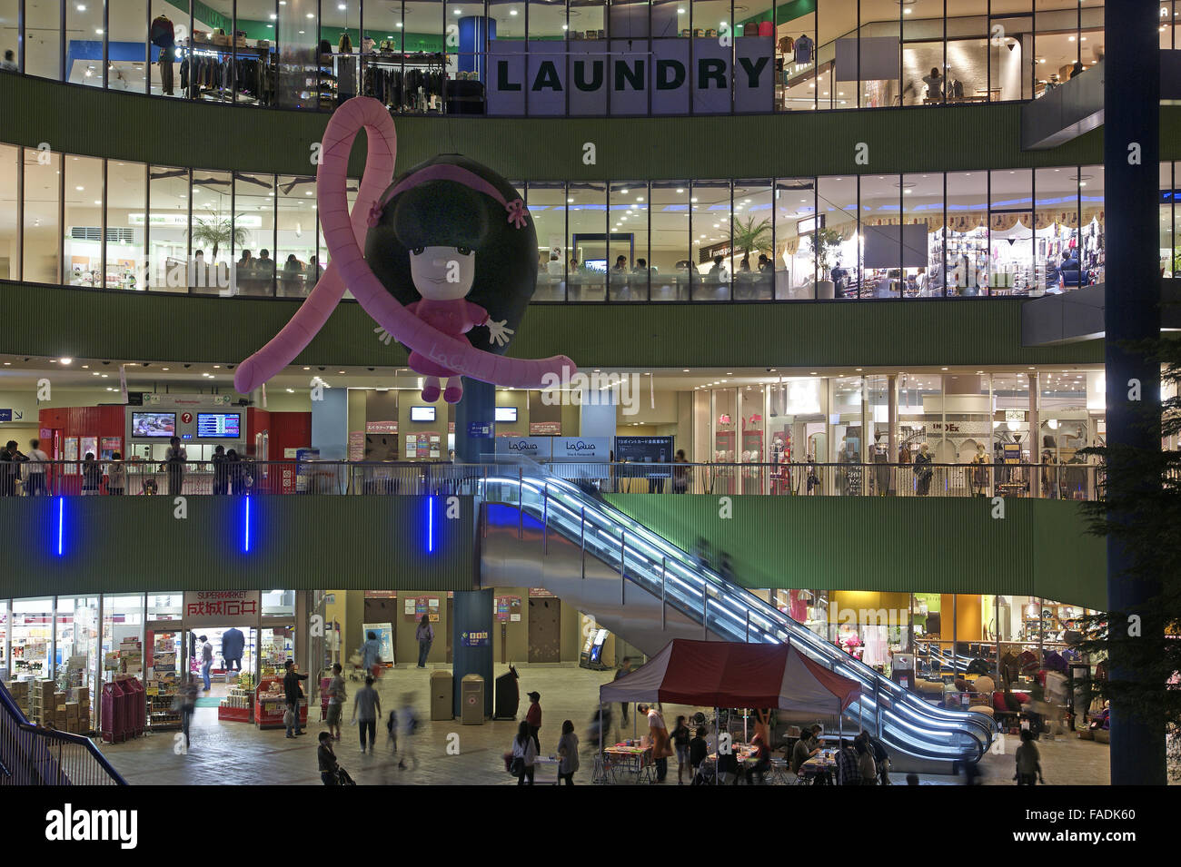 Exterior of Tokyo shopping mall at night Stock Photo