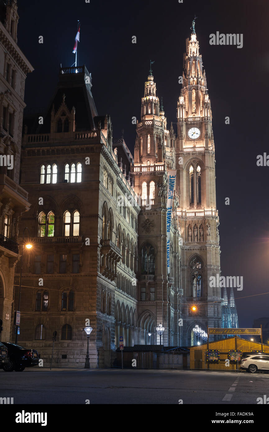 Vienna, Austria - November 4, 2015: Rathaus of Vienna. Town Hall facade fragment with night illumination, street view Stock Photo