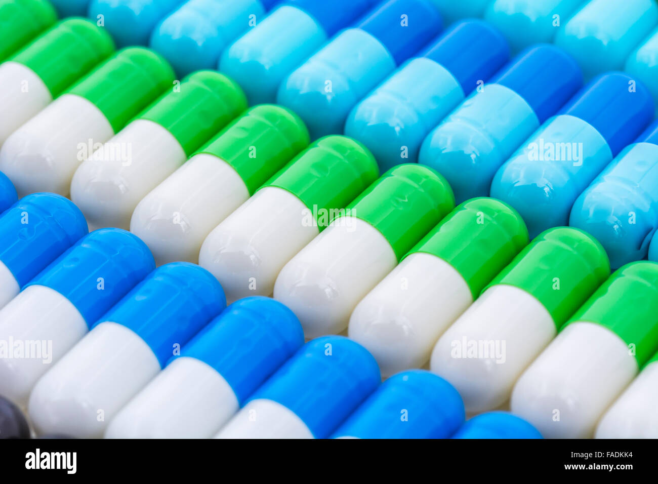 Close-up of gelatine pills - capsules. Metaphor consumer choice, variety, markets, market share, diversification, diversity, Big Pharma, drug trials Stock Photo