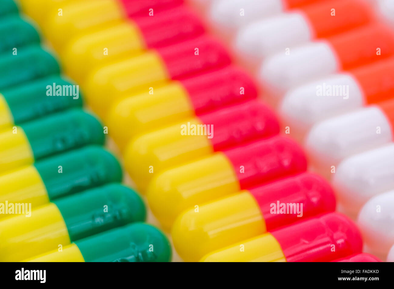 Close-up of pills - capsules made of gelatin. Visual metaphor for consumer choice, markets, market share, diversification, diversity, Big Pharma. Stock Photo