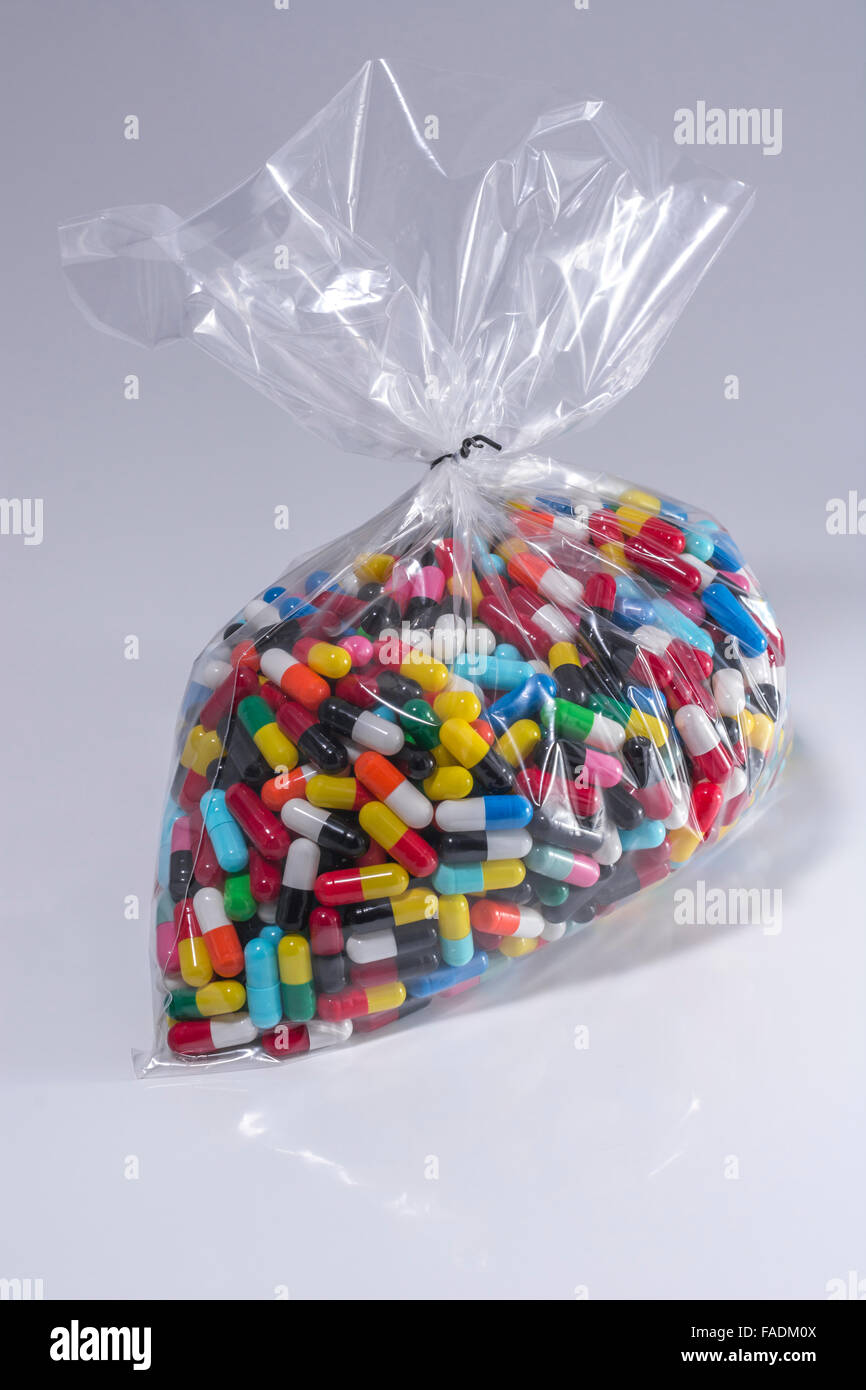 Closeup of pills capsule form made of gelatin. Metaphor choice
