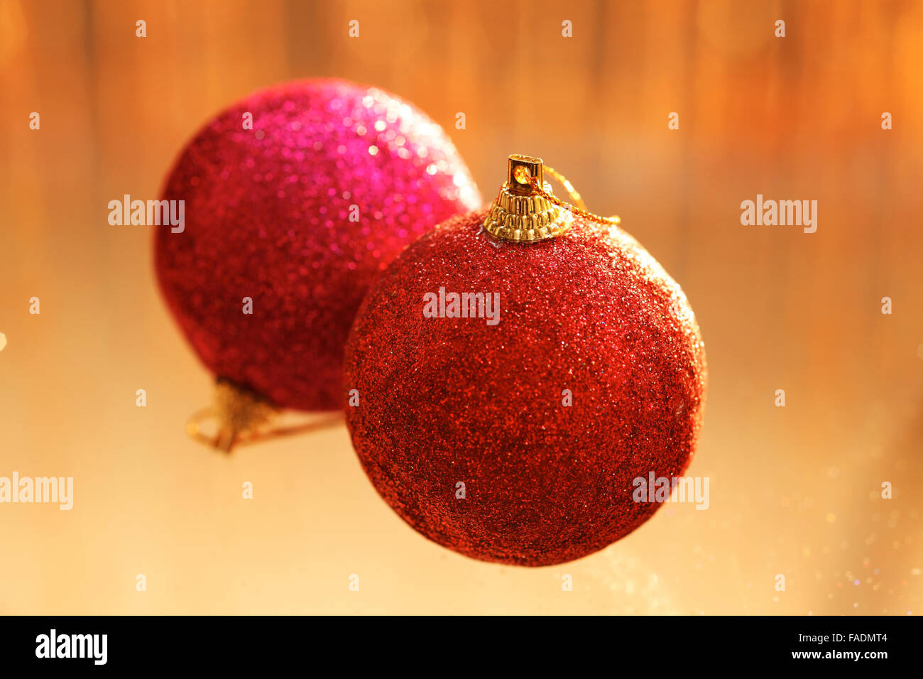 Red ornament with Christmas Tree bokeh Stock Photo Alamy
