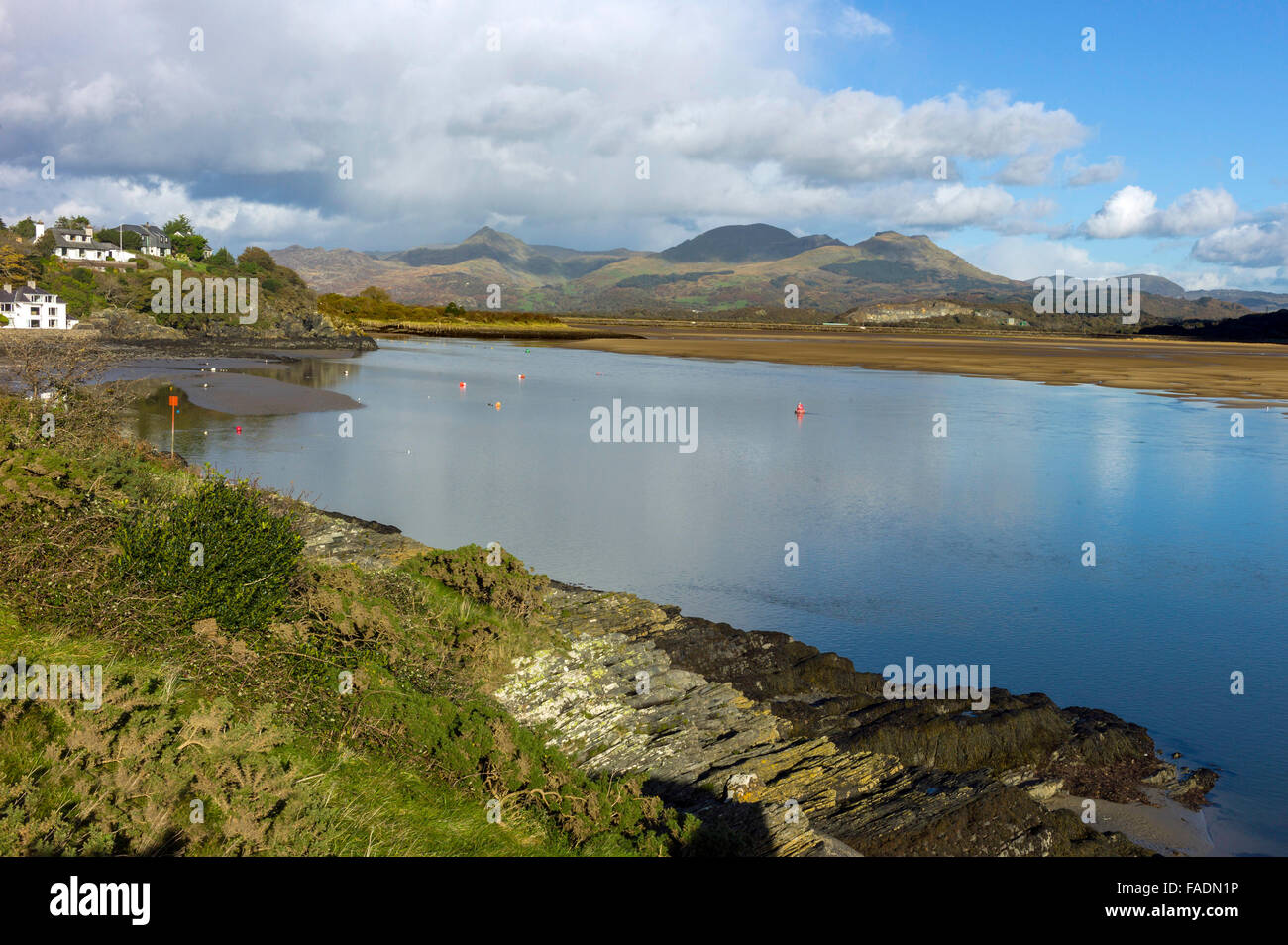 A view across the Glaslyn estuary near Both y Gest eastwards towards the Rhinog and Moelwyn mountains in the background. Stock Photo