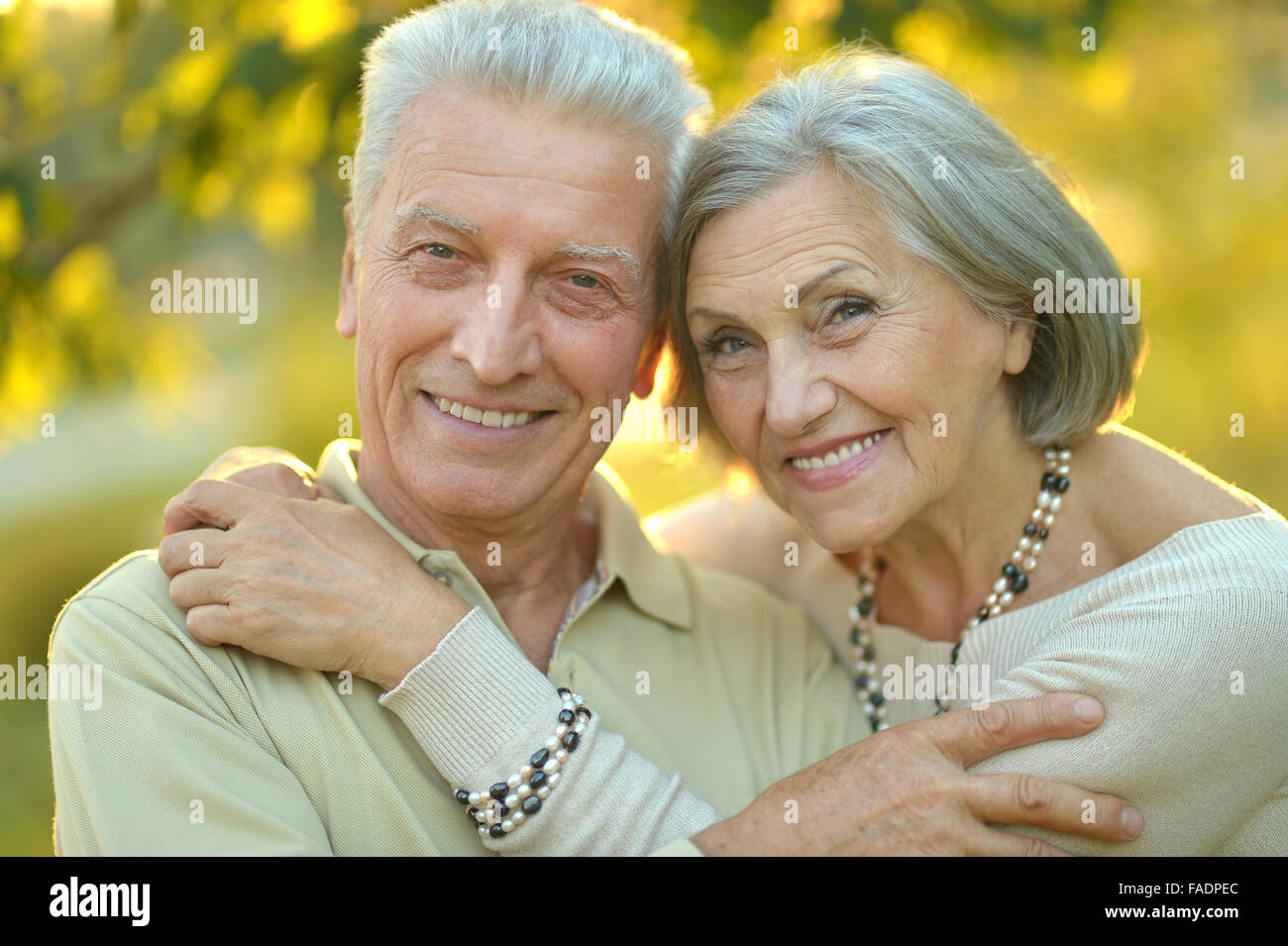 Senior couple in autumn park Stock Photo - Alamy